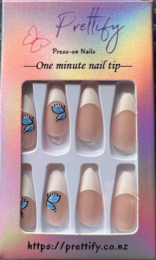 Almond Press on Nails. White tips with Blue Butterflies. Durable Acrylic Press on Nails. Easy and quick to apply. Great for those special occasions, parties or add an edge to any outfit. Gorgeous, flattering and you can re-use them again and again.