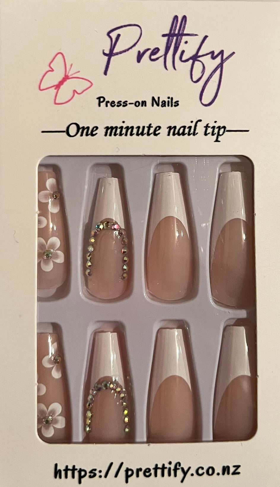 Long Coffin French Tip Press on Nails. White Tips, Flowers & Jewels. Easy and quick to apply. Great for those special occasions, parties or add an edge to any outfit. Gorgeous, flattering and you can re-use them again and again.
