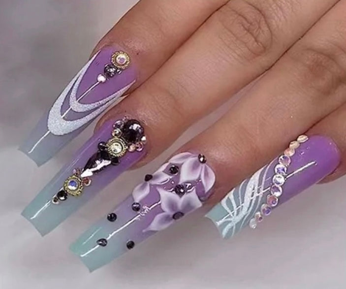 Long Coffin Press on Nails. Lilac & Blue with White Flowers & Jewels. Easy and quick to apply. Great for those special occasions, parties or add an edge to any outfit. Gorgeous, flattering and you can re-use them again and again.