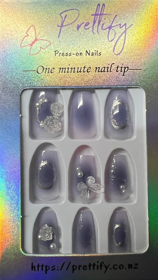 Shorter Length Coffin Press on Nails. Clear/Blue with Crystal 3D Butterflies & Roses. Easy and quick to apply. Great for those special occasions, parties or add an edge to any outfit. Gorgeous, flattering and you can re-use them again and again.