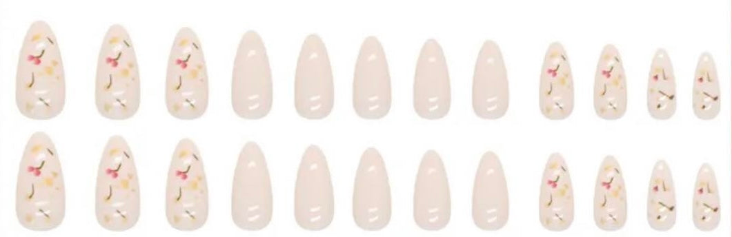 Almond Press on Nails. Cream with Flowers. Durable Acrylic Press on Nails. Easy and quick to apply. Great for those special occasions, parties or add an edge to any outfit. Gorgeous, flattering and you can re-use them again and again.