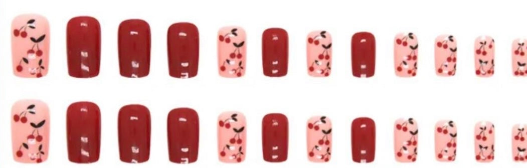 Squoval Press on Nails. Red & Pink with Cherries. Durable Acrylic Press on Nails. Easy and quick to apply. Great for those special occasions, parties or add an edge to any outfit. Gorgeous, flattering and you can re-use them again and again.