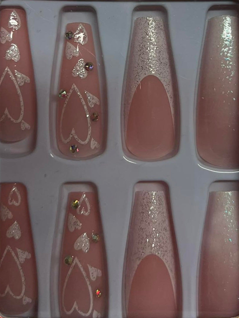 Long Coffin Press on Nails. Clear White Tips with Glitter & Hearts. Durable Acrylic Press on Nails. Easy and quick to apply. Great for those special occasions, parties or add an edge to any outfit. Gorgeous, flattering and you can re-use them again and again.
