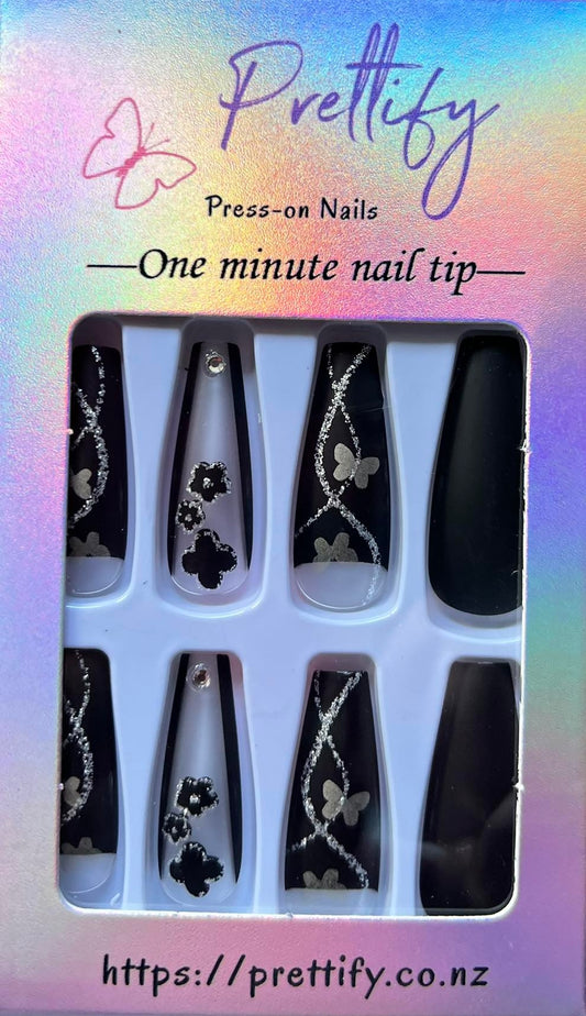 Long Coffin Press on Nails. Black/Silver/Gold with Butterflies. Durable Acrylic Press on Nails. Easy and quick to apply. Great for those special occasions, parties or add an edge to any outfit. Gorgeous, flattering and you can re-use them again and again.