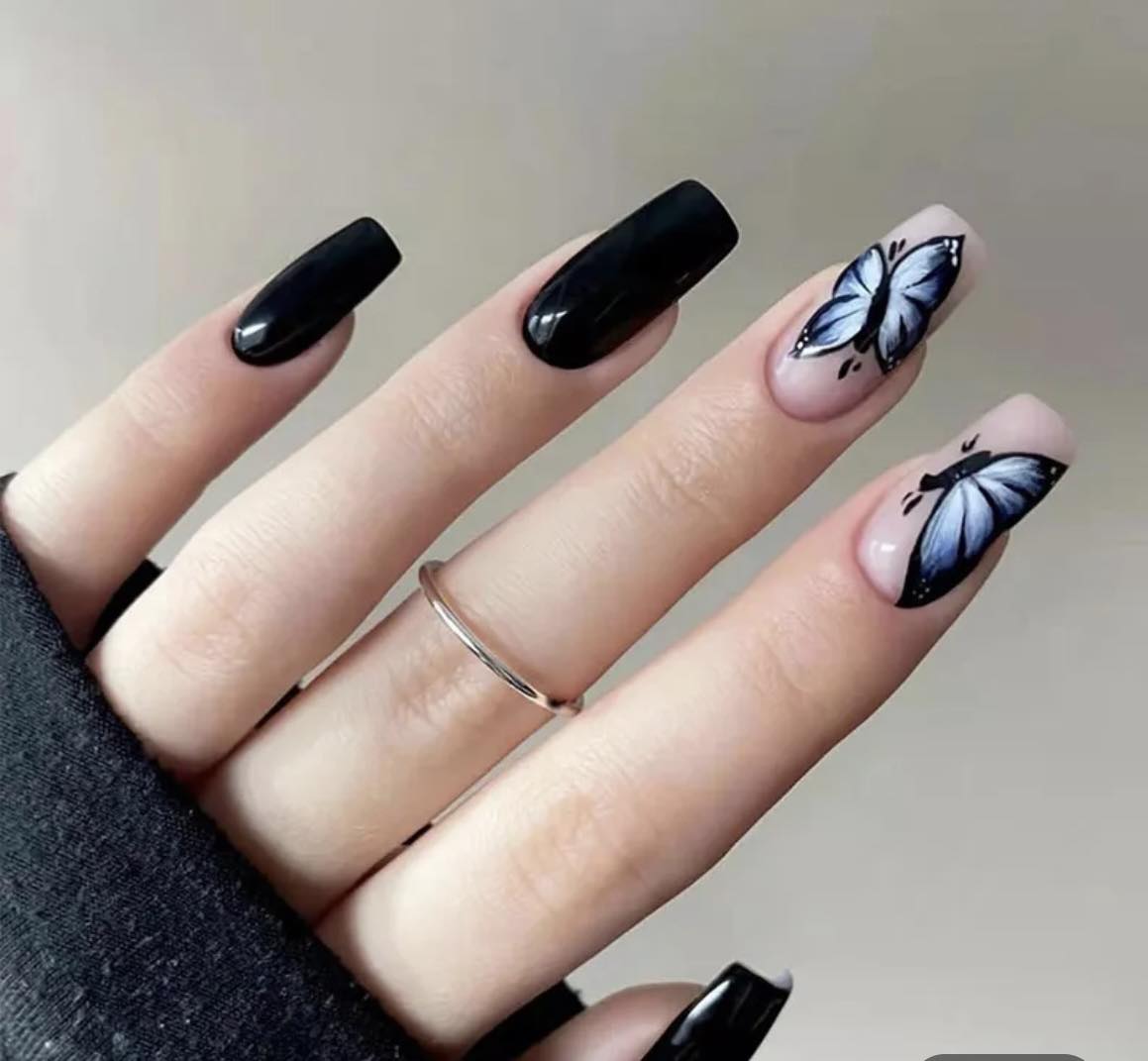 Medium Length Squoval Press on Nails. Black with Butterflies. Durable Acrylic Press on Nails. Easy and quick to apply. Great for those special occasions, parties or add an edge to any outfit. Gorgeous, flattering and you can re-use them again and again.