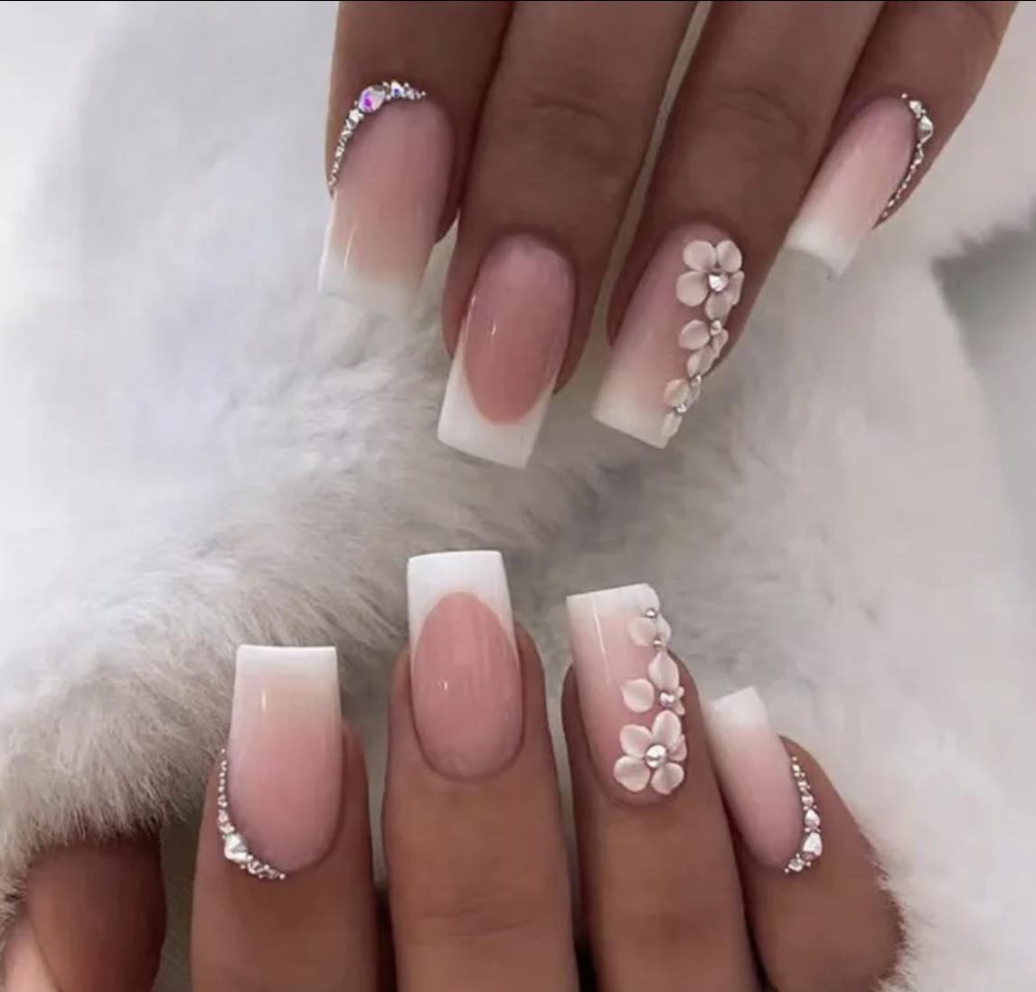 Square Press on Nails. White Tip, Jewel & Flowers. Durable Acrylic Press on Nails. These French Tip Nails are stunning and sell out fast. Easy and quick to apply. Great for any occasion. Gorgeous, flattering and you can re-use them again and again.