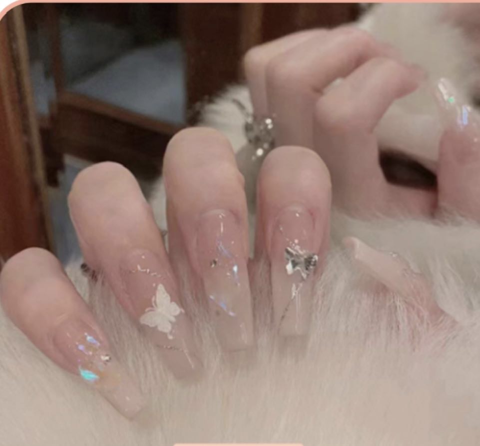 Long Coffin Press on Nails. Clear Pink with Butterflies & Jewels. Durable Acrylic Press on Nails. Easy and quick to apply. Great for those special occasions, parties or add an edge to any outfit. Gorgeous, flattering and you can re-use them again and again.