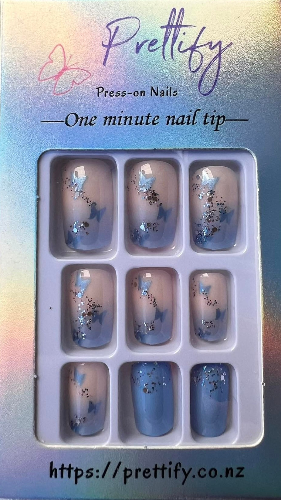 Squoval Press on Nails. Blue with Butterflies & Glitter. Durable Acrylic Press on Nails. Easy and quick to apply. Great for those special occasions, parties or add an edge to any outfit. Gorgeous, flattering and you can re-use them again and again.