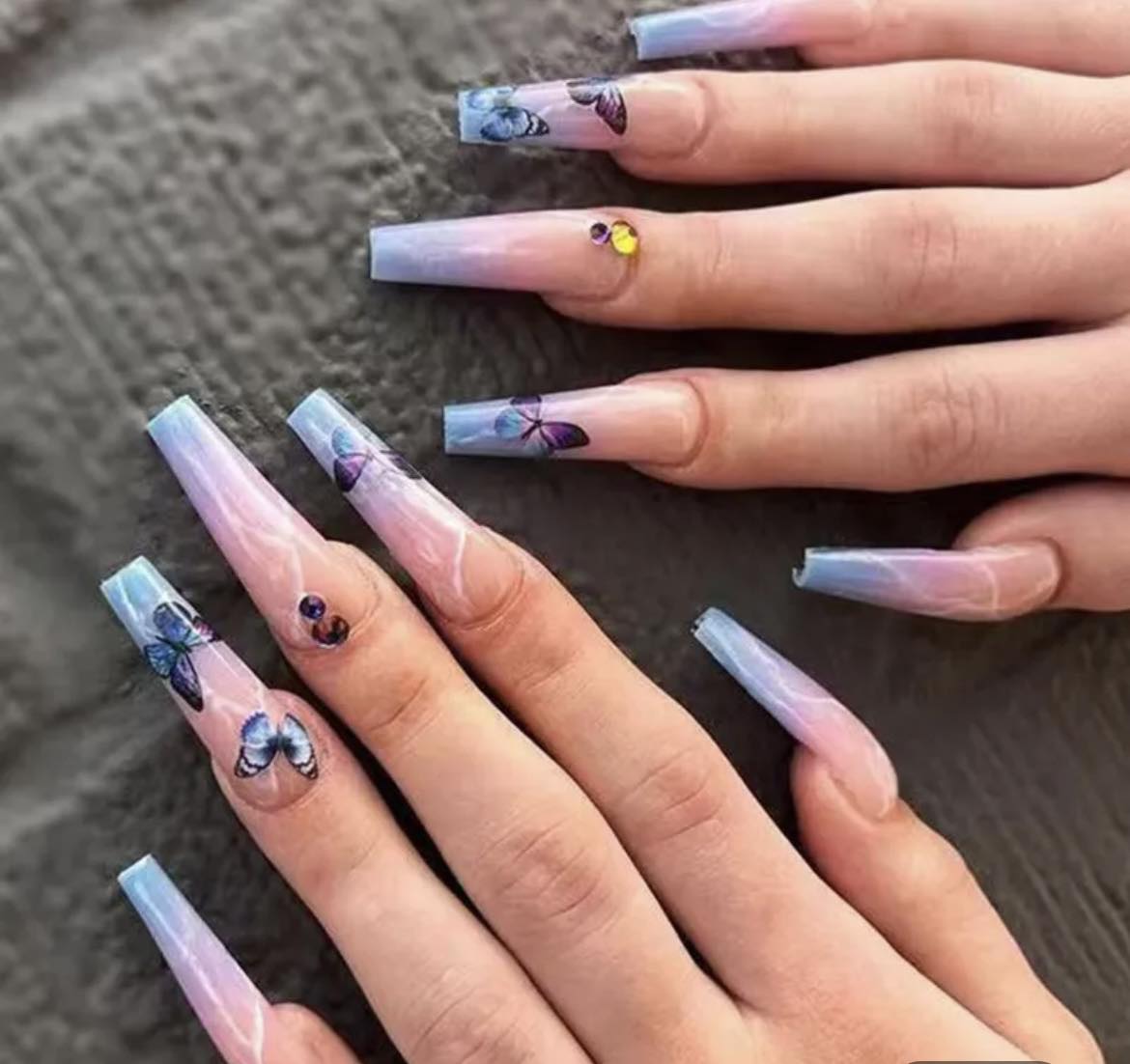Long Coffin Press on Nails. Pink & Pale Blue with Butterflies. Easy and quick to apply. Great for those special occasions, parties or add an edge to any outfit. Gorgeous, flattering and you can re-use them again and again.