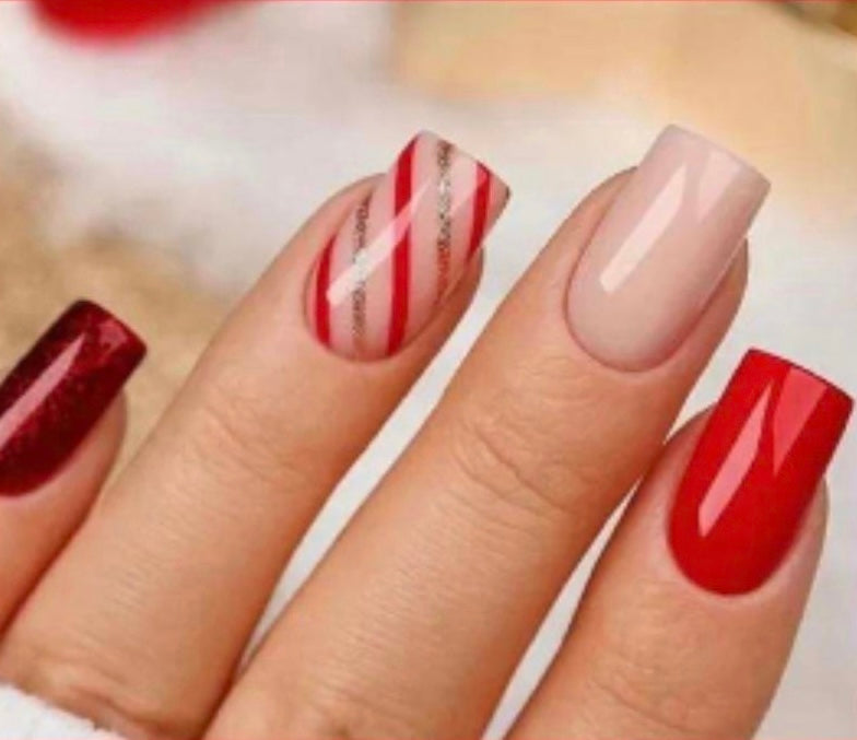 Square Press on Nails. Dark Red, Red & Cream and Red, Cream & Gold Stripes. Durable Acrylic Press on Nails. Easy and quick to apply. Great for those special occasions, parties or add an edge to any outfit. Gorgeous, flattering and you can re-use them again and again.