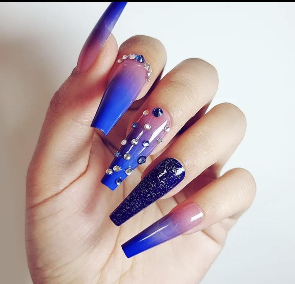 Long Coffin Press on Nails. Blue Ombre, Glitter & Jewel. Durable Acrylic Press on Nails. Easy and quick to apply. Great for those special occasions, parties or add an edge to any outfit. Gorgeous, flattering and you can re-use them again and again.