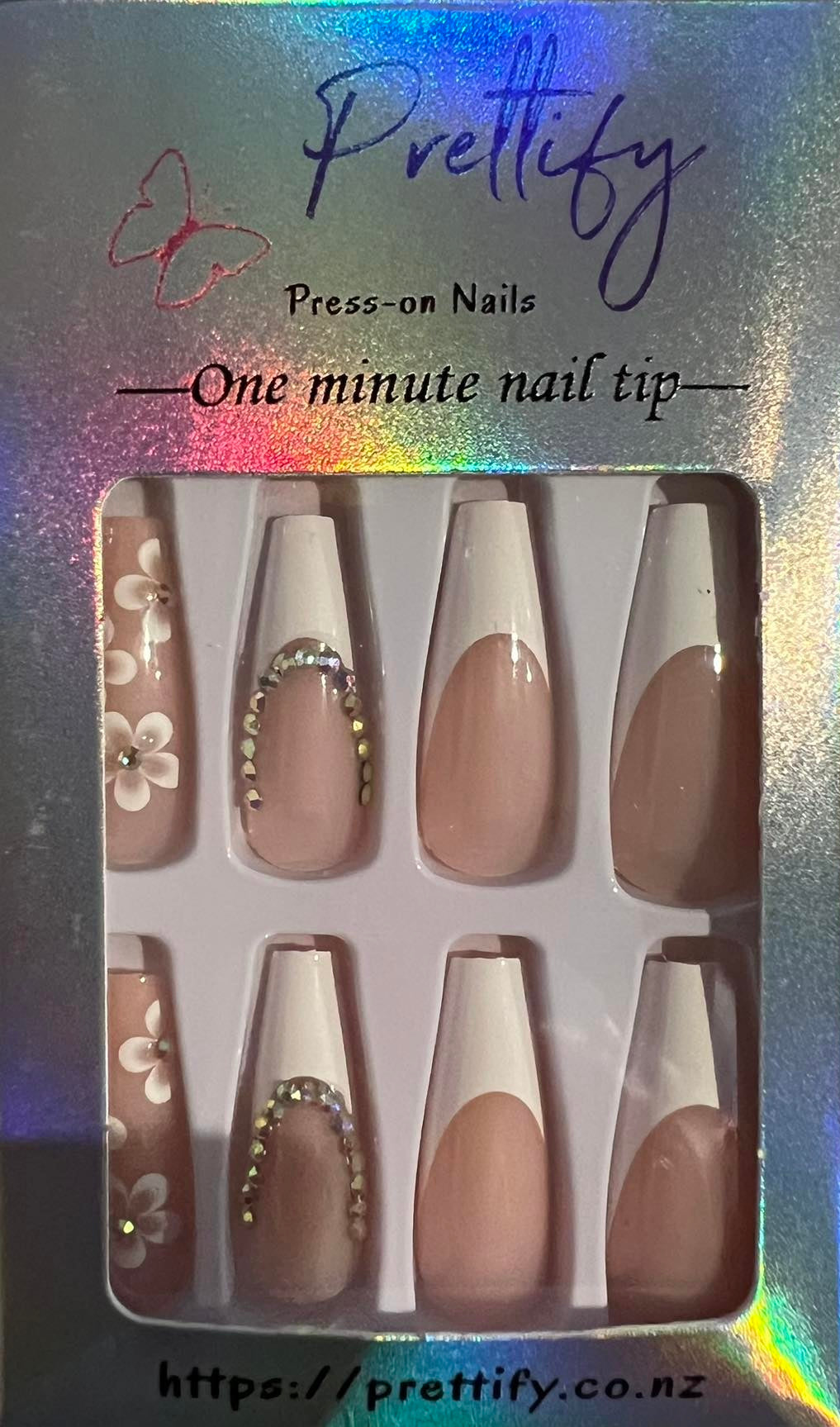 Long Coffin French Tip Press on Nails. White Tips, Flowers & Jewels. Easy and quick to apply. Great for those special occasions, parties or add an edge to any outfit. Gorgeous, flattering and you can re-use them again and again.