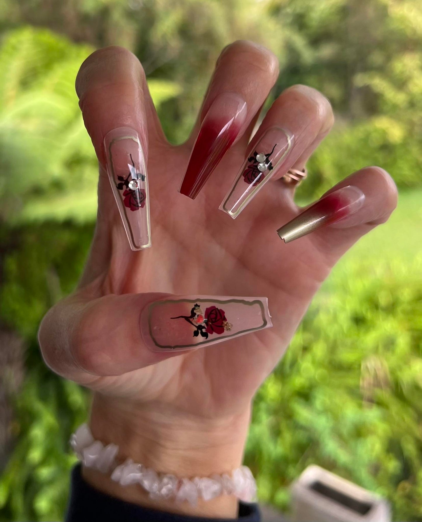 Long Coffin Press on Nails. Red Ombre with Gold Tips, Rose & Jewel. Easy and quick to apply. Great for those special occasions, parties or add an edge to any outfit. Gorgeous, flattering and you can re-use them again and again.