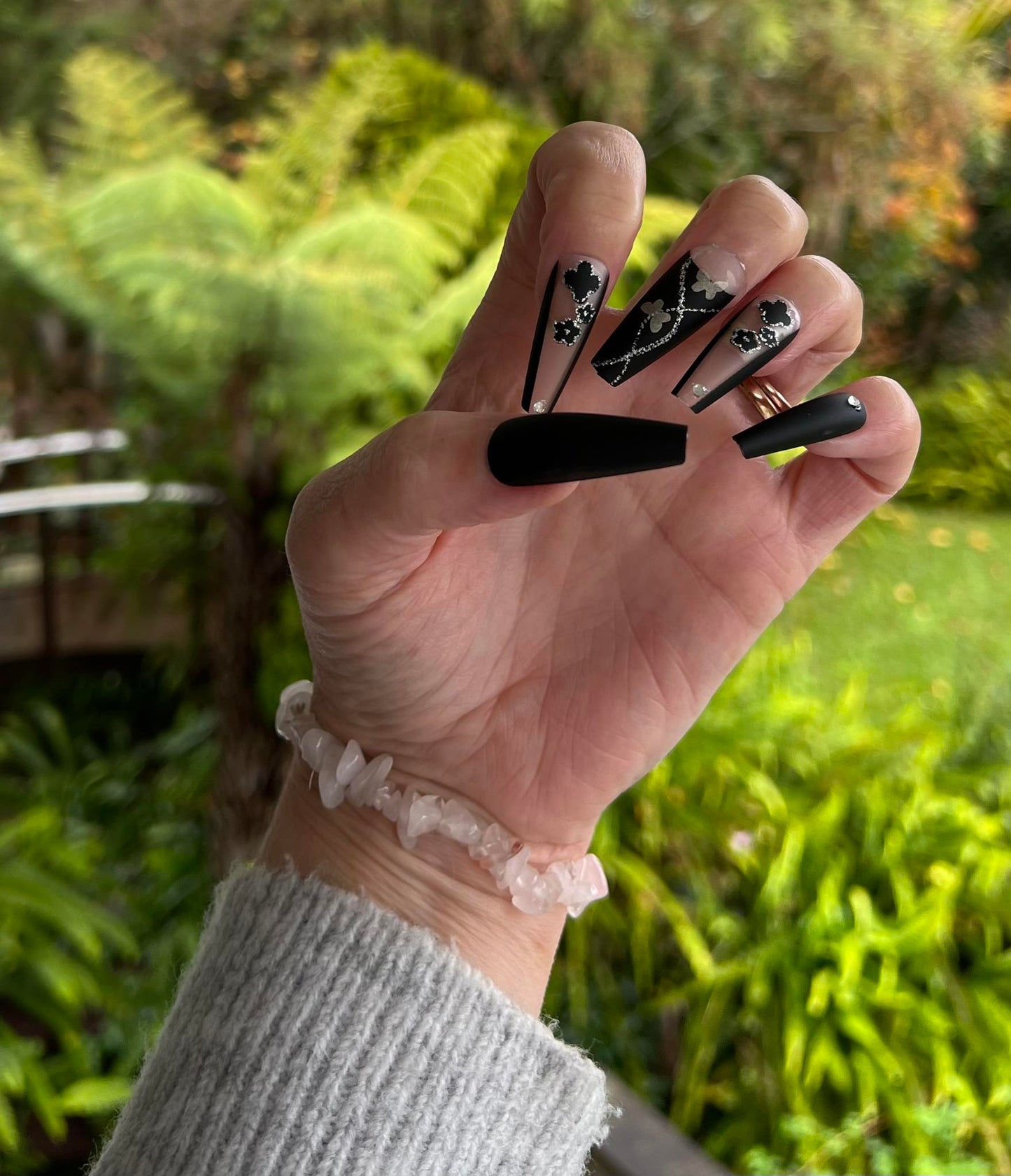 Long Coffin Press on Nails. Black/Silver/Gold with Butterflies. Durable Acrylic Press on Nails. Easy and quick to apply. Great for those special occasions, parties or add an edge to any outfit. Gorgeous, flattering and you can re-use them again and again.