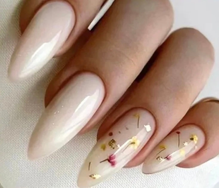 Almond Press on Nails. Cream with Flowers. Durable Acrylic Press on Nails. Easy and quick to apply. Great for those special occasions, parties or add an edge to any outfit. Gorgeous, flattering and you can re-use them again and again.
