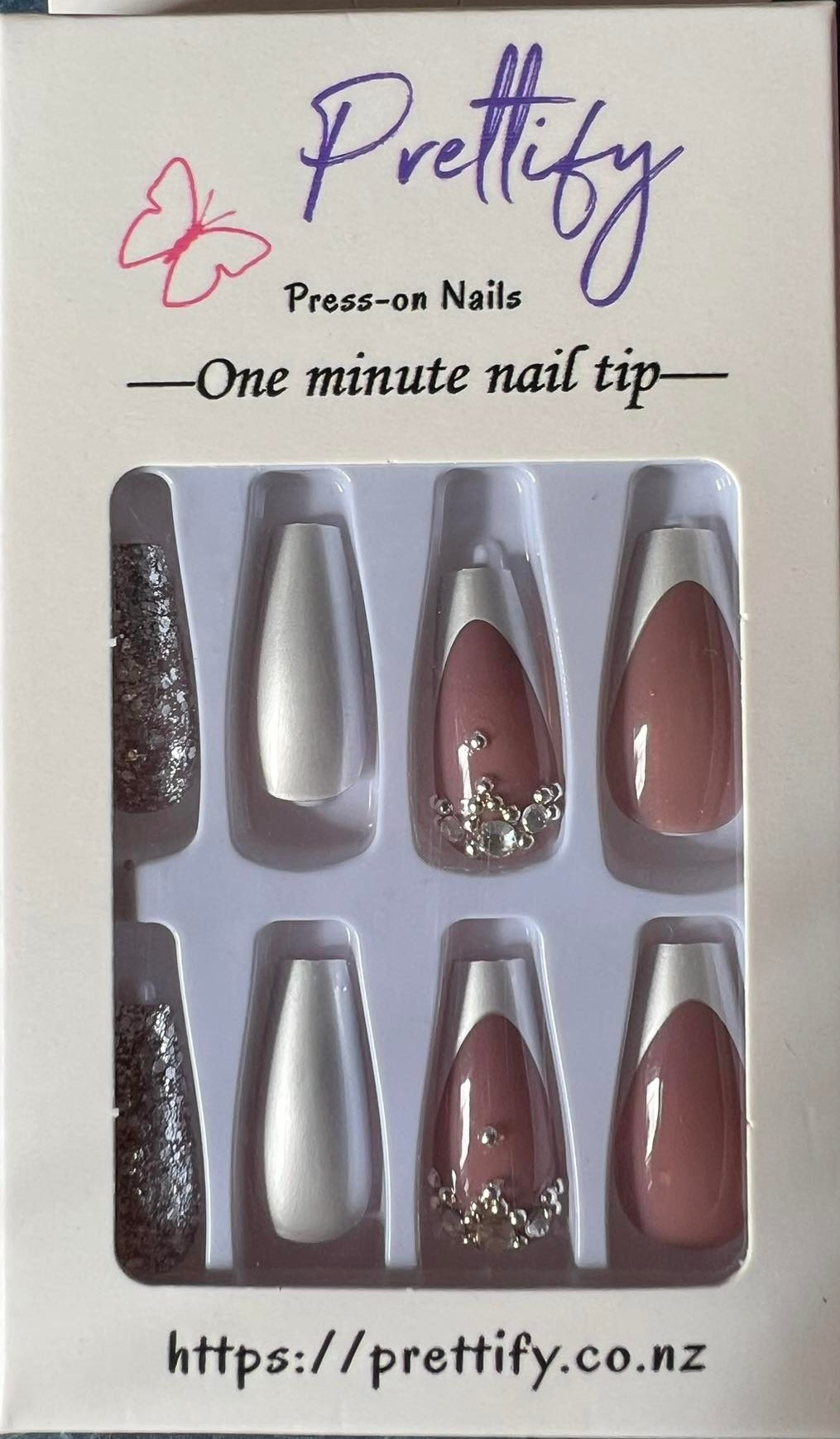 Medium Length Coffin Press on Nails. Pearl White, White Tips, Silver Glitter & Jewels. Durable Acrylic Press on Nails. Easy and quick to apply. Great for those special occasions, parties or add an edge to any outfit. Gorgeous, flattering and you can re-use them again and again.