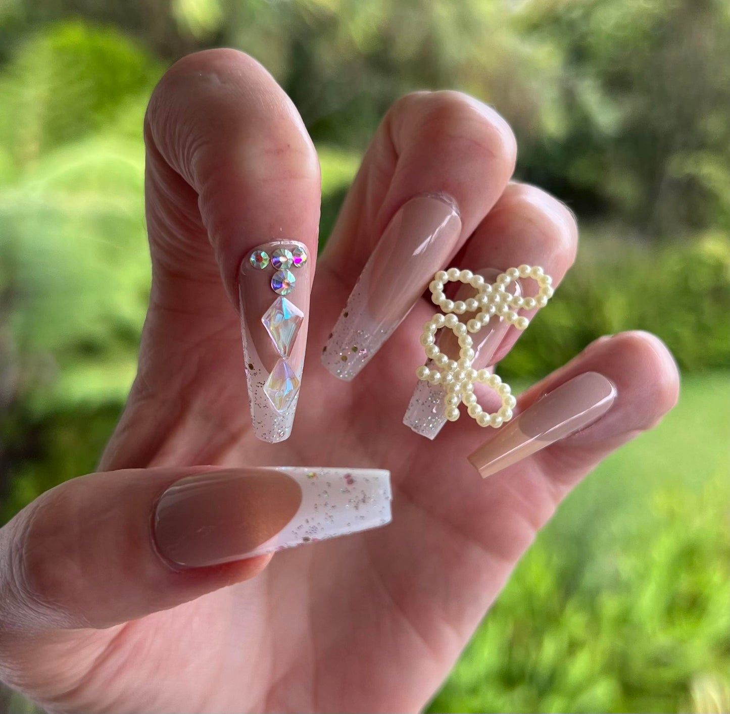 Long Coffin Press on Nails. Beige Latte with Jewels & Bows. Easy and quick to apply. Great for those special occasions, parties or add an edge to any outfit. Gorgeous, flattering and you can re-use them again and again.