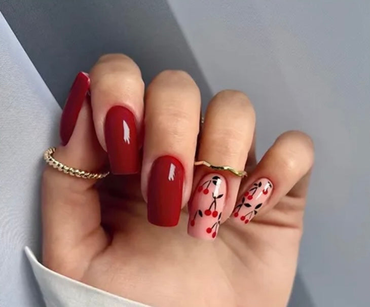 Squoval Press on Nails. Red & Pink with Cherries. Durable Acrylic Press on Nails. Easy and quick to apply. Great for those special occasions, parties or add an edge to any outfit. Gorgeous, flattering and you can re-use them again and again.