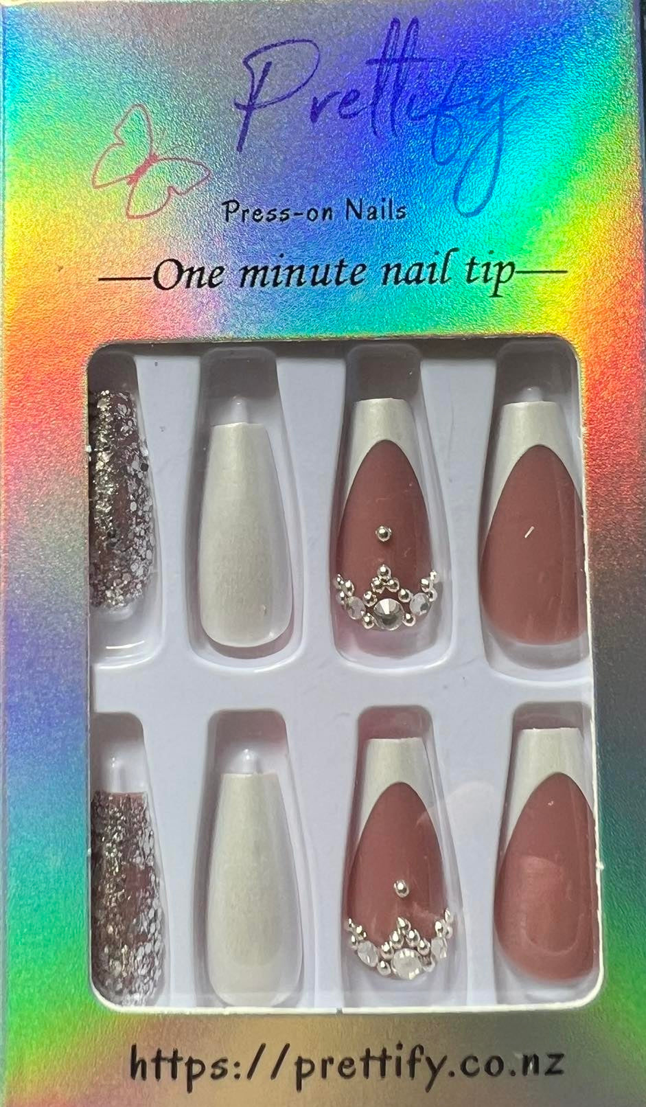 Medium Length Coffin Press on Nails. Pearl White, White Tips, Silver Glitter & Jewels. Durable Acrylic Press on Nails. Easy and quick to apply. Great for those special occasions, parties or add an edge to any outfit. Gorgeous, flattering and you can re-use them again and again.