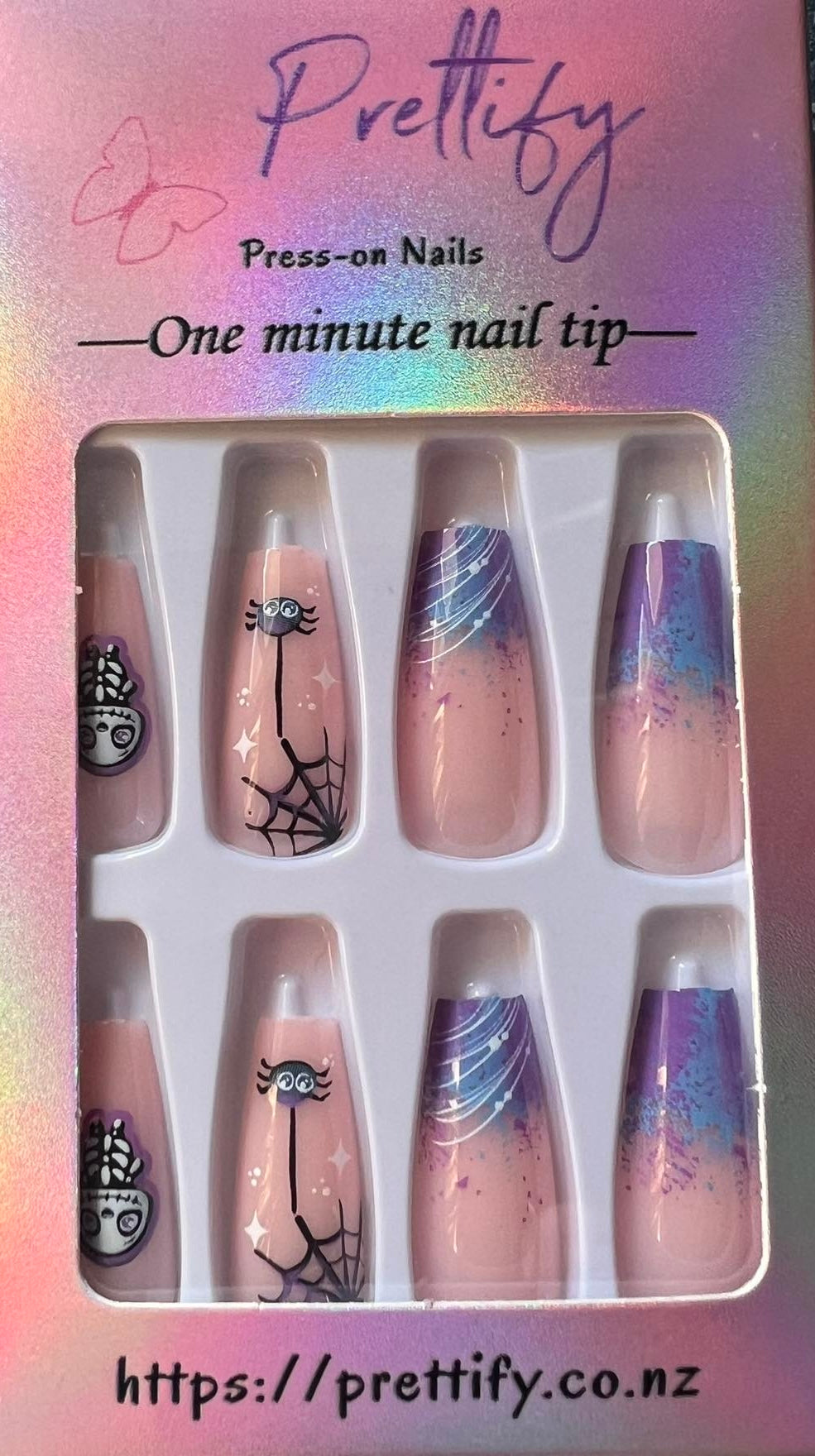 Spooky Halloween Press on Nails.Medium Length Coffin Nails. Pin with Blue, Purple & White Tips with Spiders and Spider Webs and Skeletons.