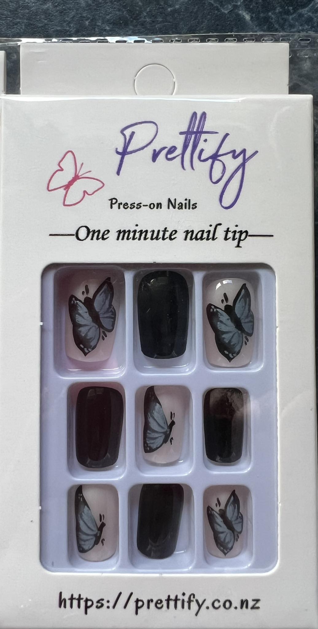 Medium Length Squoval Press on Nails. Black with Butterflies. Durable Acrylic Press on Nails. Easy and quick to apply. Great for those special occasions, parties or add an edge to any outfit. Gorgeous, flattering and you can re-use them again and again.