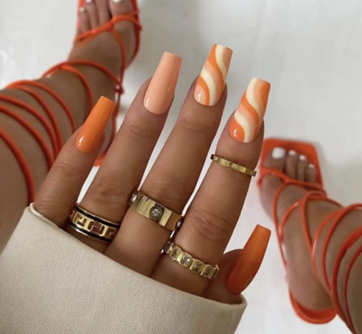 Orange, Peach & Cream Swirl Coffin Style Nails.