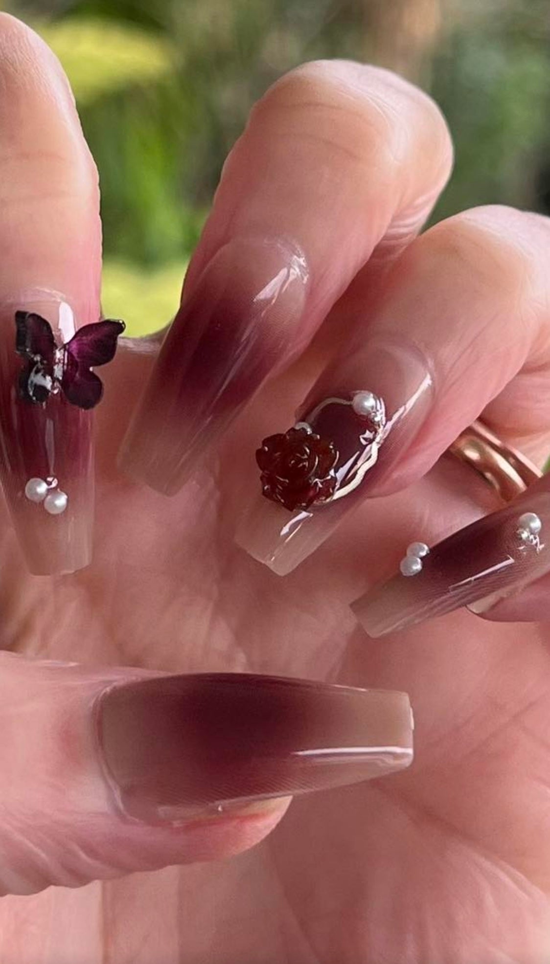 Long Coffin Press on Nails. Deep Plum, Clear Tips with Jewels, Butteflies & Flowers. Easy and quick to apply. Great for those special occasions, parties or add an edge to any outfit. Gorgeous, flattering and you can re-use them again and again.